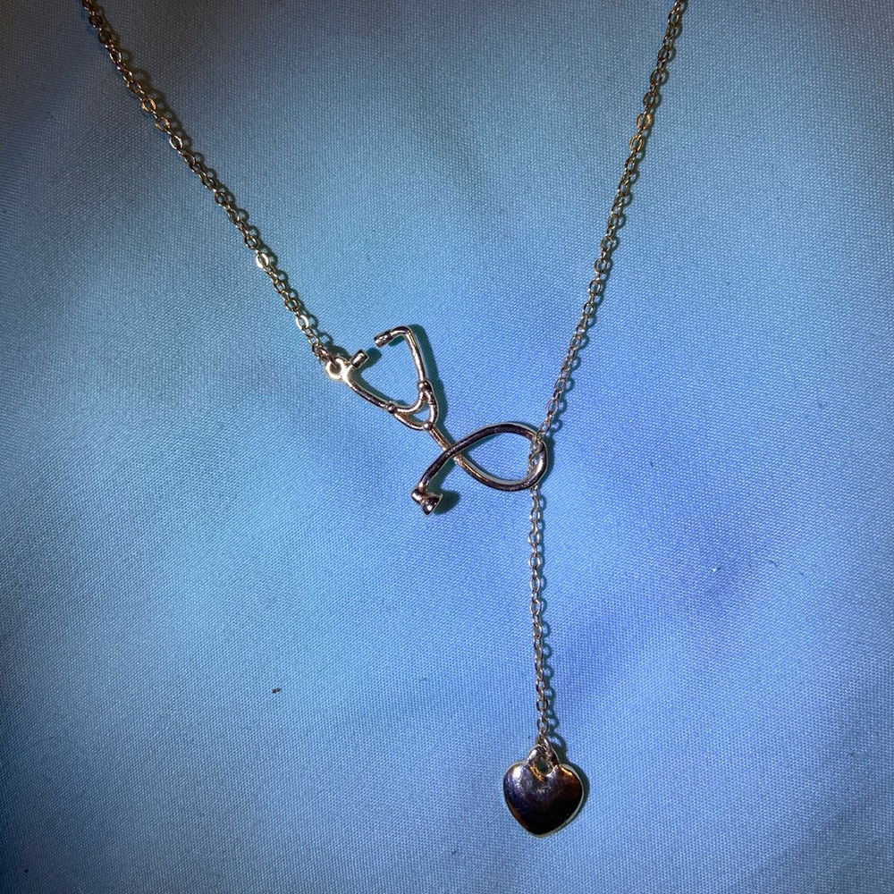 Gold stethoscope necklace